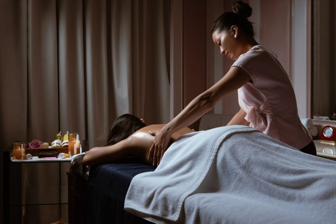 Relaxing Spa Setting with candles and towels